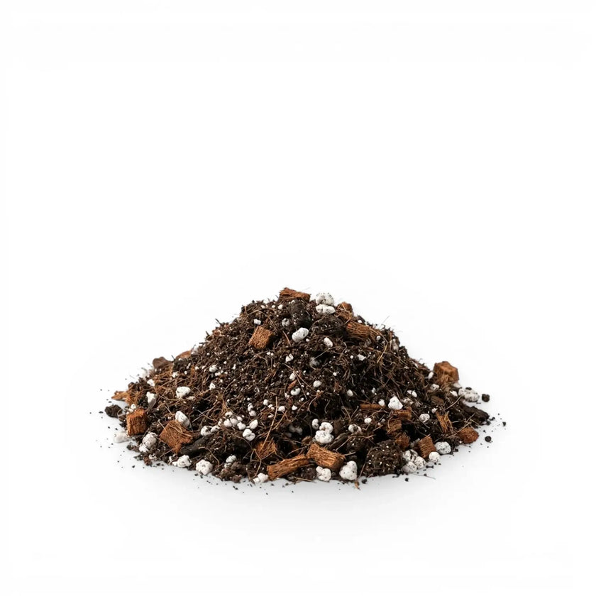 Heap of aroid potting mixwith small white stones on a white background