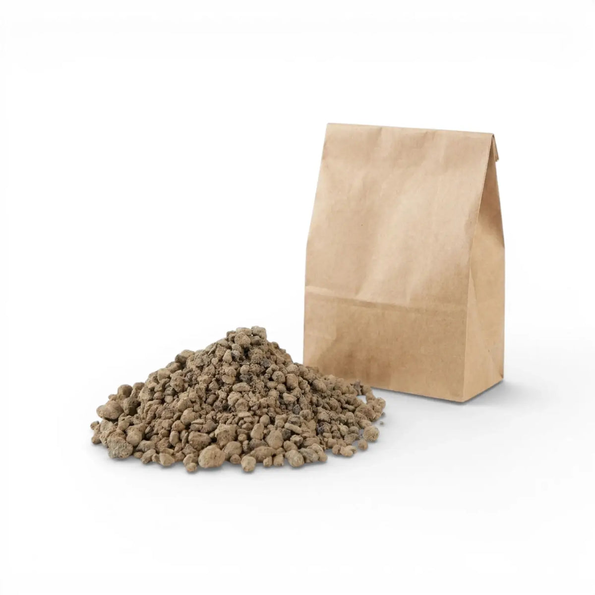 Brown lava granulate next to a brown paper bag on a white background