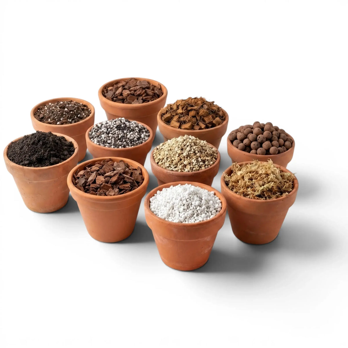 Collection of terracotta pots with different types of soil and potting materials on a white background