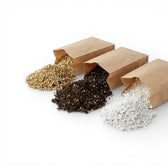 Three brown paper bags filled with ingredients of propagation soil mix on a white background