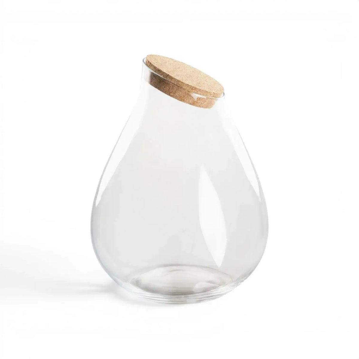 Clear glass jar Drop with a cork  lid on a white background