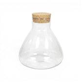 Clear glass jar Pyramide  with a cork lid on a white background