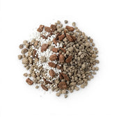 Ingredients of  hoya substrate mix: perlite, pine bark and lava granulate mixed together  on a white background