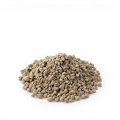 Pile of brown  lava granulate on a white background