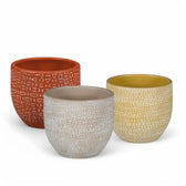 Planter 'Amarante' on white background.