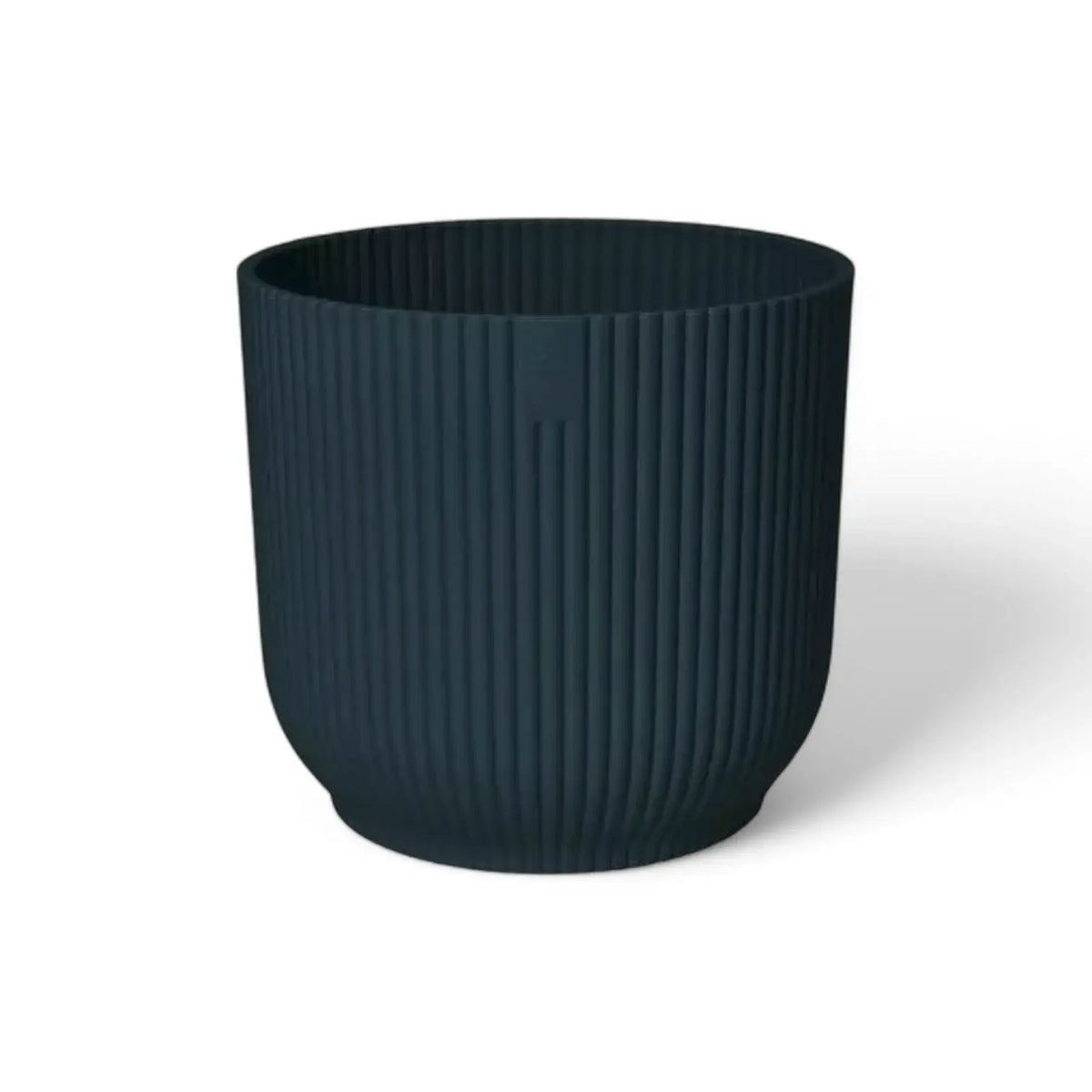 Planter 'vibes fold round' on white background.