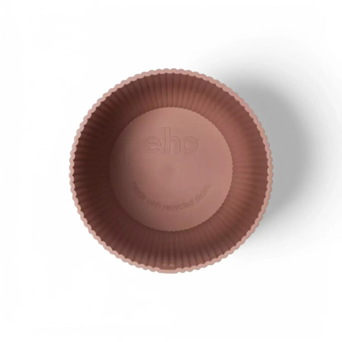 Planter 'vibes fold round' on white background.