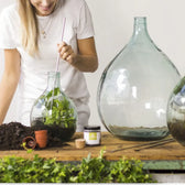Terrarium Pick-Up Tool with Claw on white background.