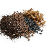 Terrarium substrate mix ingredients: soil, lava granules, sphagnum moss and activated carbon pellets on white backround